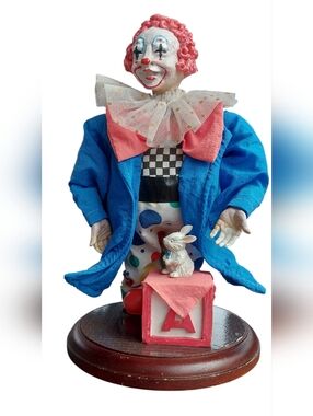 Vintage Musical Clown Figurine with Blue Jacket and Pink Accents